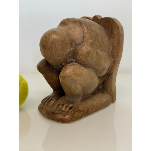 141 - Hand carved constricted figural book end, 16 cm high.

This lot is available for in-house shipping