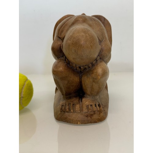 141 - Hand carved constricted figural book end, 16 cm high.

This lot is available for in-house shipping