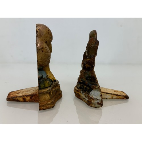 142 - Cast iron door stops duck and a squirrel from late 1930’s.

This lot is available for in-house shipp... 