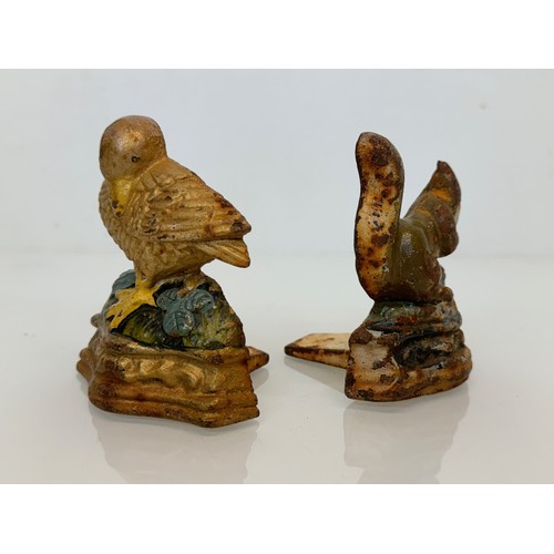 142 - Cast iron door stops duck and a squirrel from late 1930’s.

This lot is available for in-house shipp... 