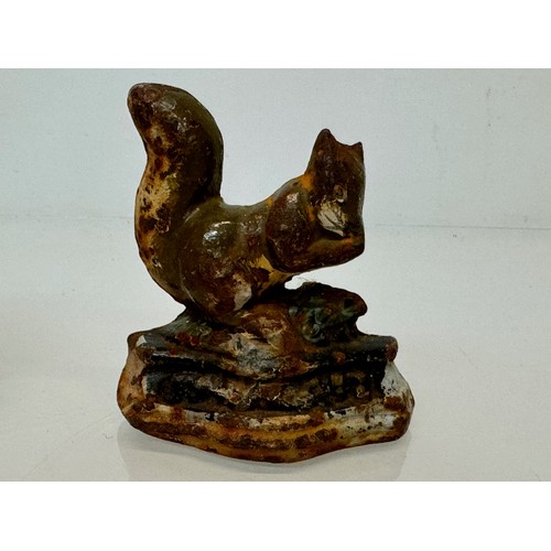 142 - Cast iron door stops duck and a squirrel from late 1930’s.

This lot is available for in-house shipp... 