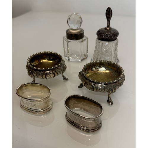 149 - Mixed lot, hall marked silver etc, includes a pair of table salts and a perfume bottle. 

This lot i... 