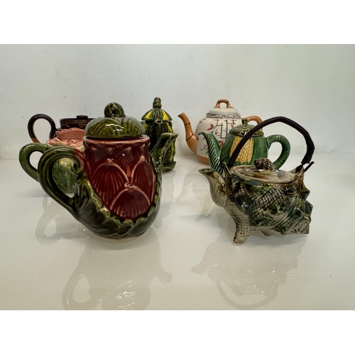 150 - Collection of seven ceramic tea pots, some quirky studio pottery examples.

This lot is available fo... 