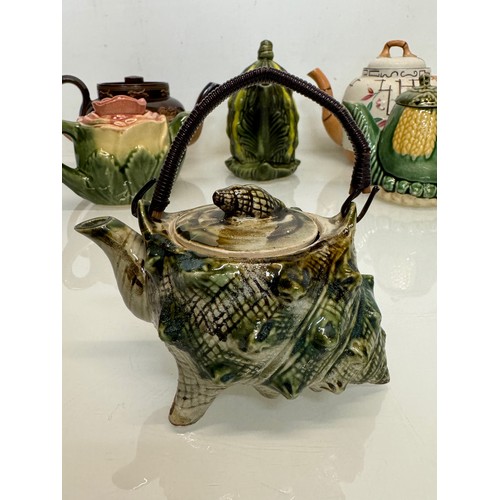 150 - Collection of seven ceramic tea pots, some quirky studio pottery examples.

This lot is available fo... 