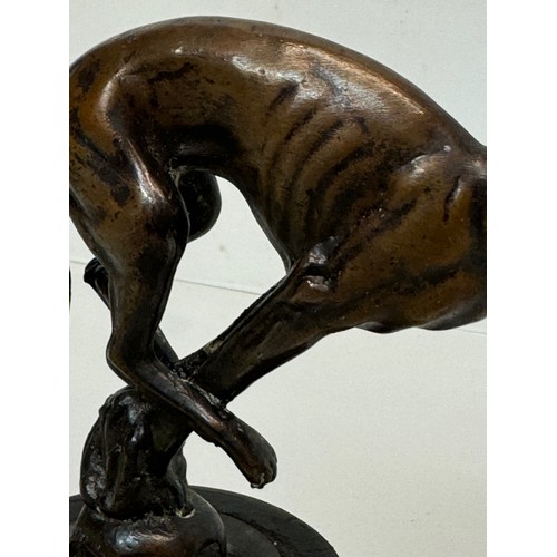 162 - Automobilia, a greyhound mascot marked for Colman on stand, 17 cm high.

This lot is available for i... 