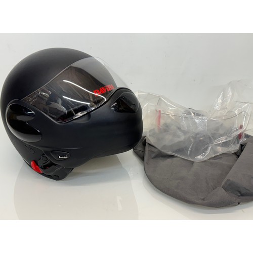 165 - A Davida motorcycle crash helmet size L with flip up chin guard and spare visor.

This lot is availa... 