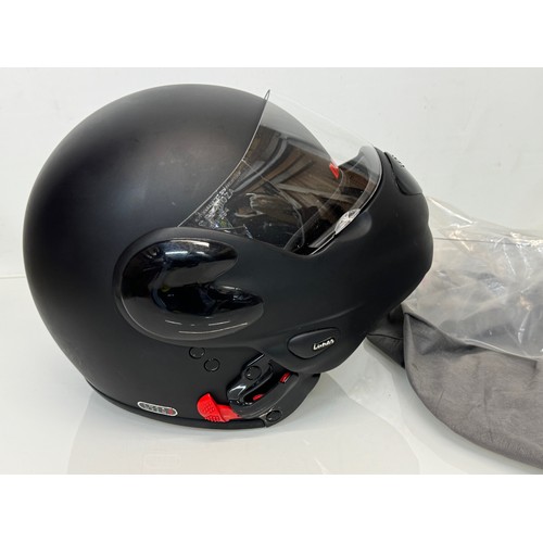 165 - A Davida motorcycle crash helmet size L with flip up chin guard and spare visor.

This lot is availa... 