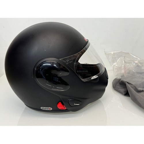 165 - A Davida motorcycle crash helmet size L with flip up chin guard and spare visor.

This lot is availa... 