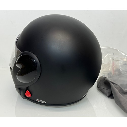 165 - A Davida motorcycle crash helmet size L with flip up chin guard and spare visor.

This lot is availa... 