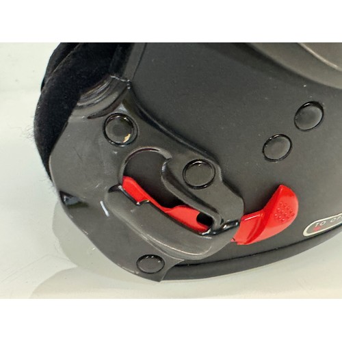 165 - A Davida motorcycle crash helmet size L with flip up chin guard and spare visor.

This lot is availa... 