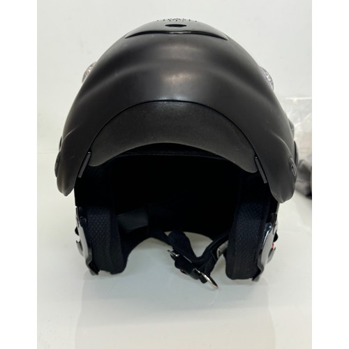 165 - A Davida motorcycle crash helmet size L with flip up chin guard and spare visor.

This lot is availa... 