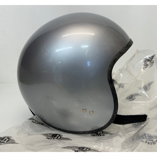 166 - A Davida leather lined open face helmet size M.

This lot is available for in-house shipping