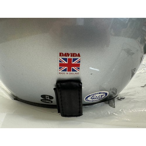 166 - A Davida leather lined open face helmet size M.

This lot is available for in-house shipping