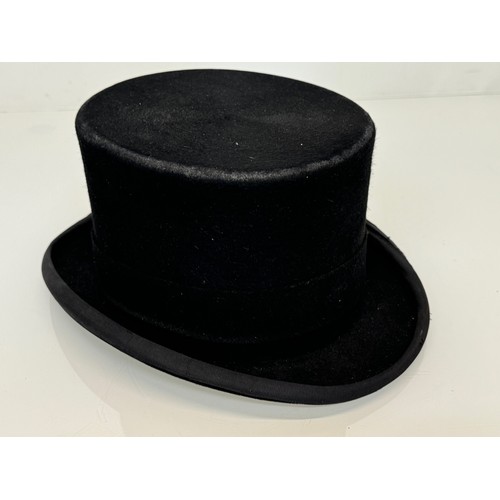 190 - A vintage Christy’s of London top hat.

This lot is available for in-house shipping