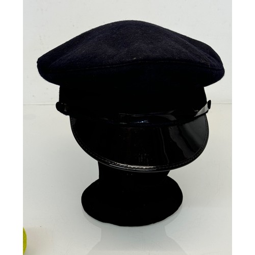 191 - A Railway peaked cap.

This lot is available for in-house shipping