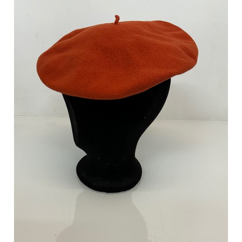 192 - Hats, Mid Century fashion, A Mary Quant orange berry produced by Kangol and a Herbert Johnson of New... 