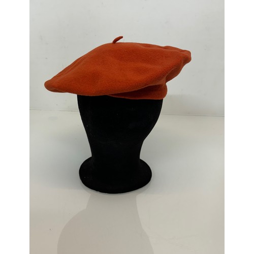 192 - Hats, Mid Century fashion, A Mary Quant orange berry produced by Kangol and a Herbert Johnson of New... 