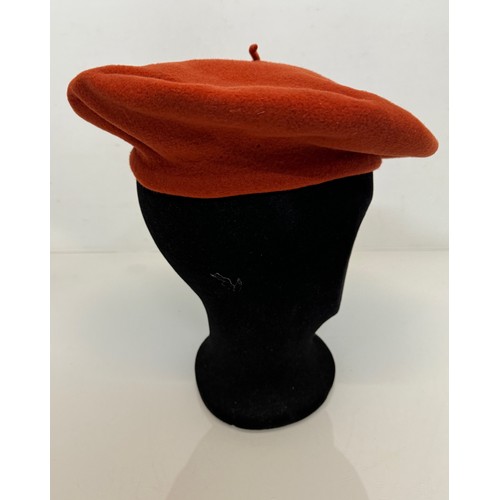 192 - Hats, Mid Century fashion, A Mary Quant orange berry produced by Kangol and a Herbert Johnson of New... 