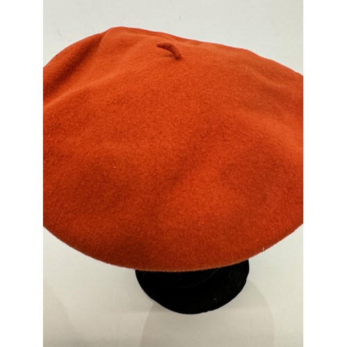 192 - Hats, Mid Century fashion, A Mary Quant orange berry produced by Kangol and a Herbert Johnson of New... 