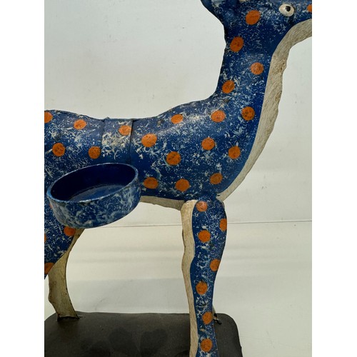 193 - Painted tin plate figure of a reindeer, 35 cm tall.

This lot is available for in-house shipping