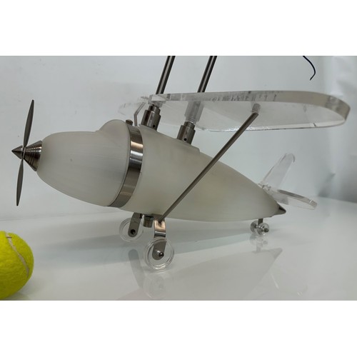 195 - Aeroplane ceiling light, moulded glass body 43 cm long 

This lot is available for in-house shipping