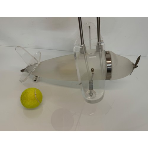 195 - Aeroplane ceiling light, moulded glass body 43 cm long 

This lot is available for in-house shipping