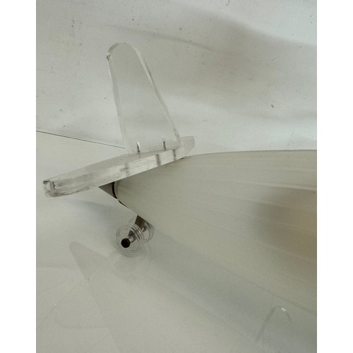 195 - Aeroplane ceiling light, moulded glass body 43 cm long 

This lot is available for in-house shipping