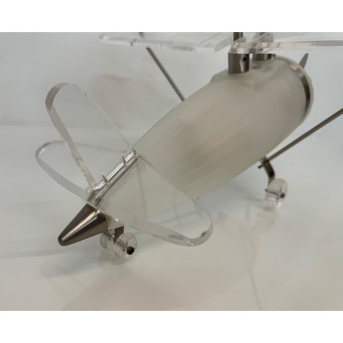 195 - Aeroplane ceiling light, moulded glass body 43 cm long 

This lot is available for in-house shipping