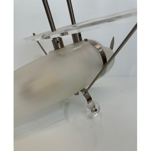 195 - Aeroplane ceiling light, moulded glass body 43 cm long 

This lot is available for in-house shipping