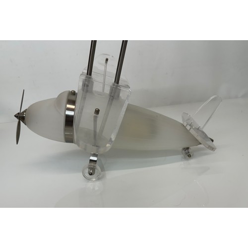 195 - Aeroplane ceiling light, moulded glass body 43 cm long 

This lot is available for in-house shipping