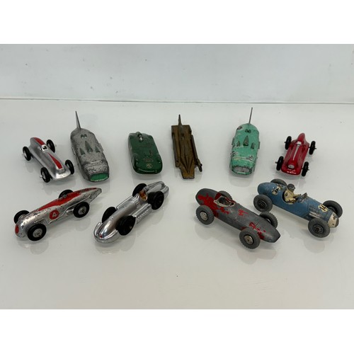 210 - A collection of die cast model land speed record race cars and motor racing cars. Dinky etc.

This l... 