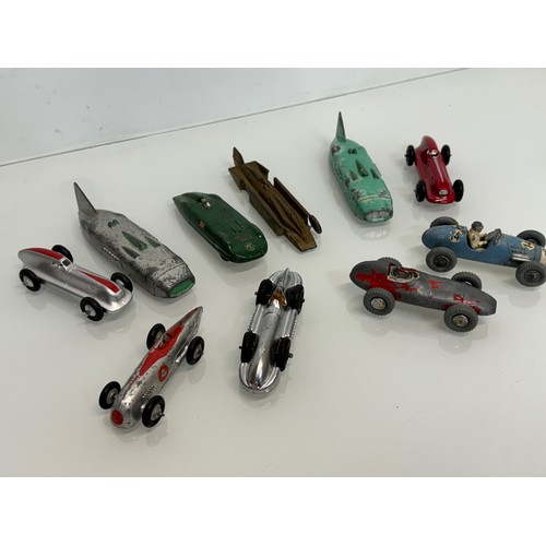 210 - A collection of die cast model land speed record race cars and motor racing cars. Dinky etc.

This l... 