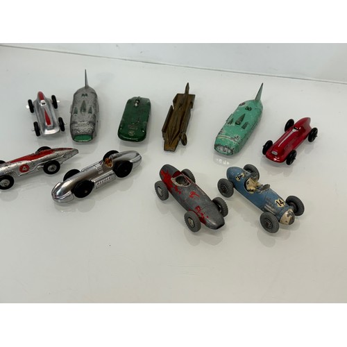 210 - A collection of die cast model land speed record race cars and motor racing cars. Dinky etc.

This l... 