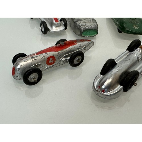 210 - A collection of die cast model land speed record race cars and motor racing cars. Dinky etc.

This l... 