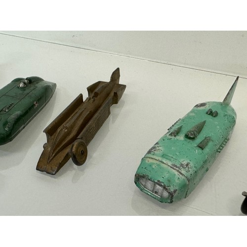 210 - A collection of die cast model land speed record race cars and motor racing cars. Dinky etc.

This l... 