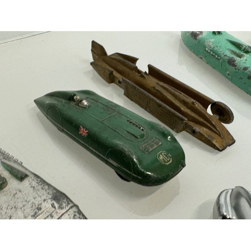 210 - A collection of die cast model land speed record race cars and motor racing cars. Dinky etc.

This l... 