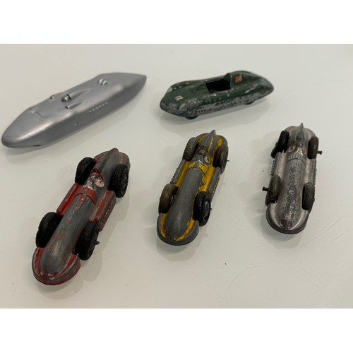 211 - A collection of five model motor racing cars. Dinky etc.

This lot is available for in-house shippin... 