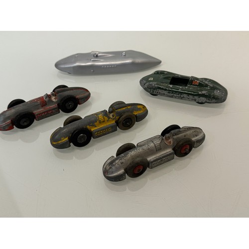 211 - A collection of five model motor racing cars. Dinky etc.

This lot is available for in-house shippin... 