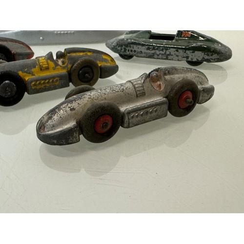 211 - A collection of five model motor racing cars. Dinky etc.

This lot is available for in-house shippin... 