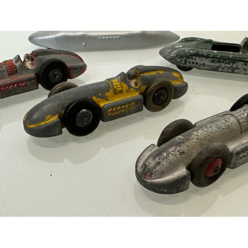 211 - A collection of five model motor racing cars. Dinky etc.

This lot is available for in-house shippin... 