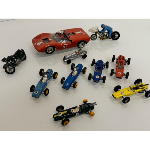 212 - A Scalextric slot car and a group of die cast single seat racing motor cars and motorcycle toys. Din... 