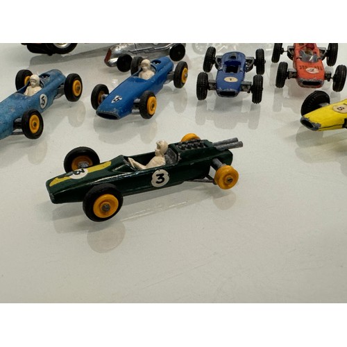 212 - A Scalextric slot car and a group of die cast single seat racing motor cars and motorcycle toys. Din... 