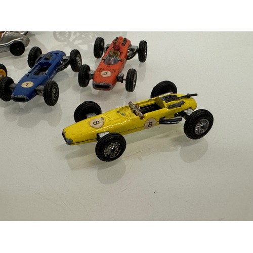 212 - A Scalextric slot car and a group of die cast single seat racing motor cars and motorcycle toys. Din... 