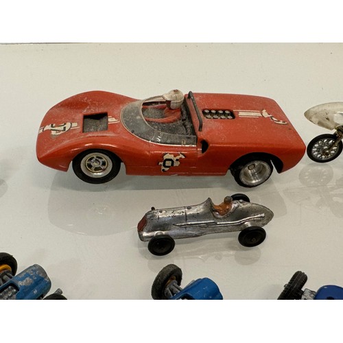 212 - A Scalextric slot car and a group of die cast single seat racing motor cars and motorcycle toys. Din... 