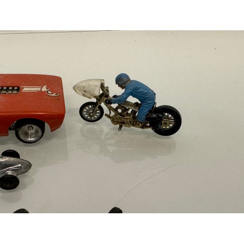 212 - A Scalextric slot car and a group of die cast single seat racing motor cars and motorcycle toys. Din... 