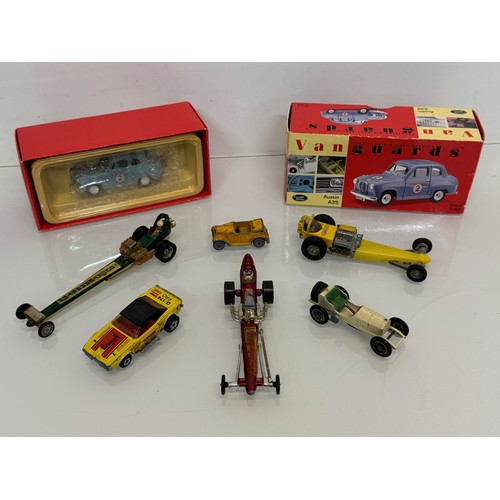 214 - Diecast toys, racing motor cars and a boxed Vanguard Austin A 35. Matchbox etc.

This lot is availab... 