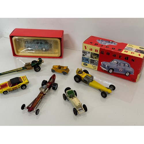 214 - Diecast toys, racing motor cars and a boxed Vanguard Austin A 35. Matchbox etc.

This lot is availab... 