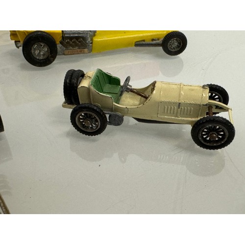 214 - Diecast toys, racing motor cars and a boxed Vanguard Austin A 35. Matchbox etc.

This lot is availab... 