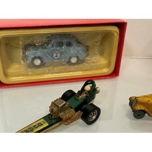 214 - Diecast toys, racing motor cars and a boxed Vanguard Austin A 35. Matchbox etc.

This lot is availab... 