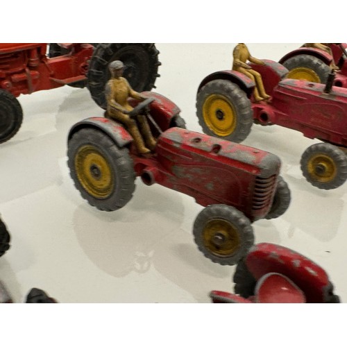 215 - Die cast toys, a collection of tractors and two model cannons. Dinky Corgi etc.

This lot is availab... 